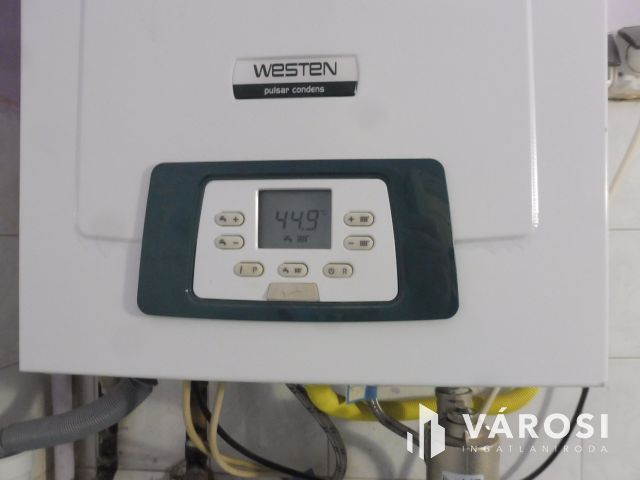 Saját kertes,szép kis lakás,garázzsal eladó.